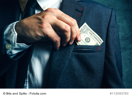 Businessman putting dollar banknotes money in his suit pocket, elegant businessperson with cash.